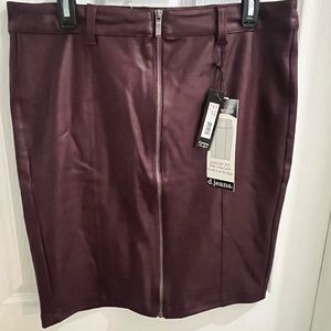 Maroon stretch faux leather skirt.